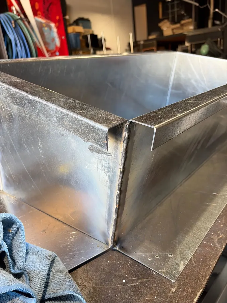 Hand-formed sheet metal corner detail